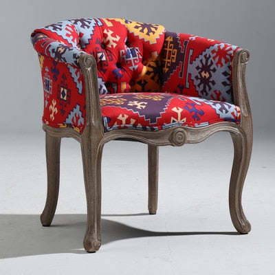 Fauteuil vintage capitonné impérial