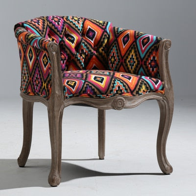 Fauteuil vintage capitonné impérial