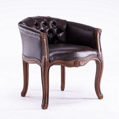 Fauteuil vintage capitonné impérial