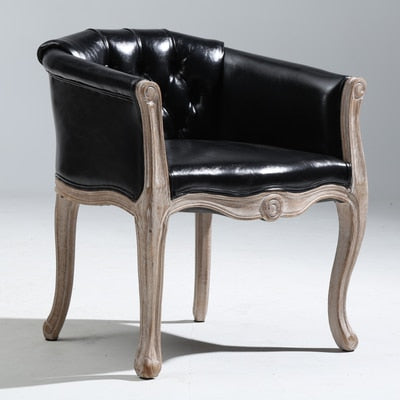 Fauteuil vintage capitonné impérial