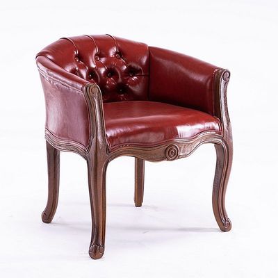 Fauteuil vintage capitonné impérial