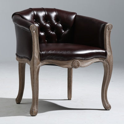 Fauteuil vintage capitonné impérial