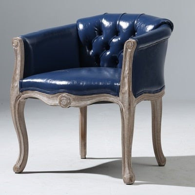 Fauteuil vintage capitonné impérial