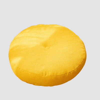 Coussin de sol rond avec capiton unique