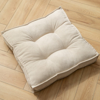Coussin carré adaptable sol ou siège en tissu capitonné