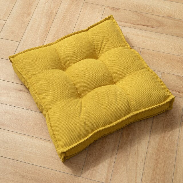 Coussin carré adaptable sol ou siège en tissu capitonné