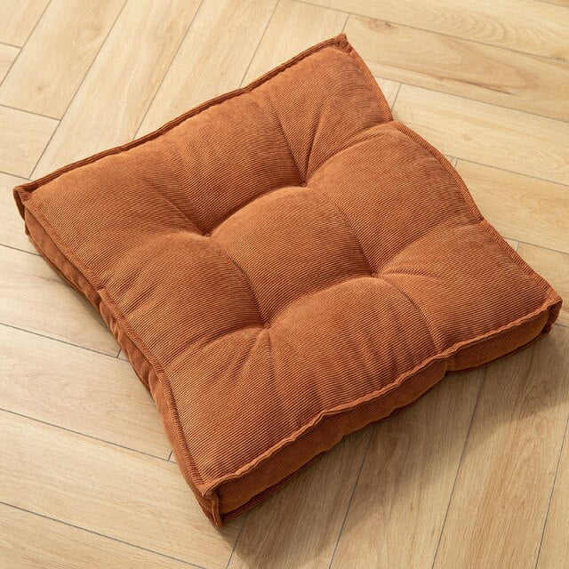 Coussin carré adaptable sol ou siège en tissu capitonné