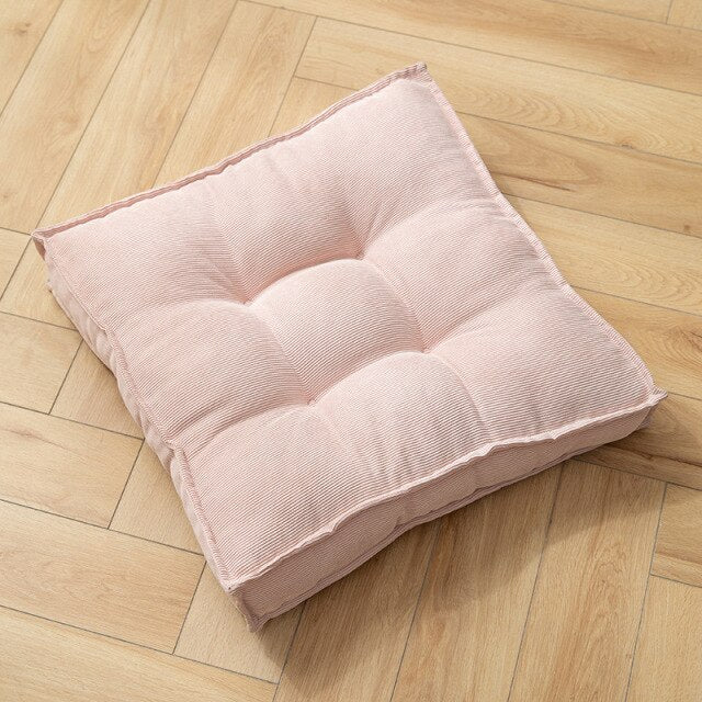 Coussin carré adaptable sol ou siège en tissu capitonné