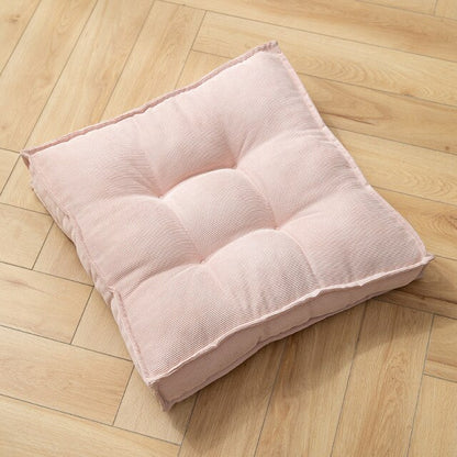 Coussin carré adaptable sol ou siège en tissu capitonné